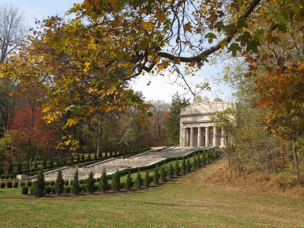 memorial building with trees around it, fall time