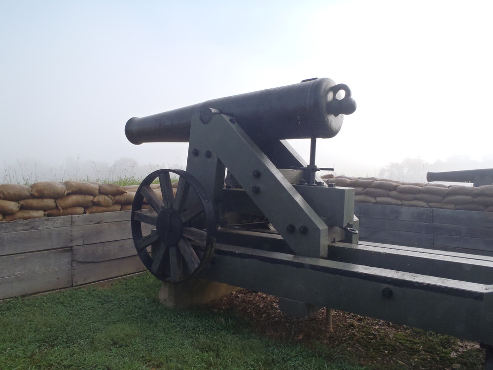 cannon, carriage, sandbags, fog