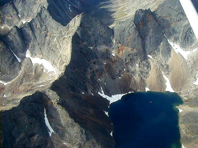The granite peaks of the Arrigetch surround a cirque lake.