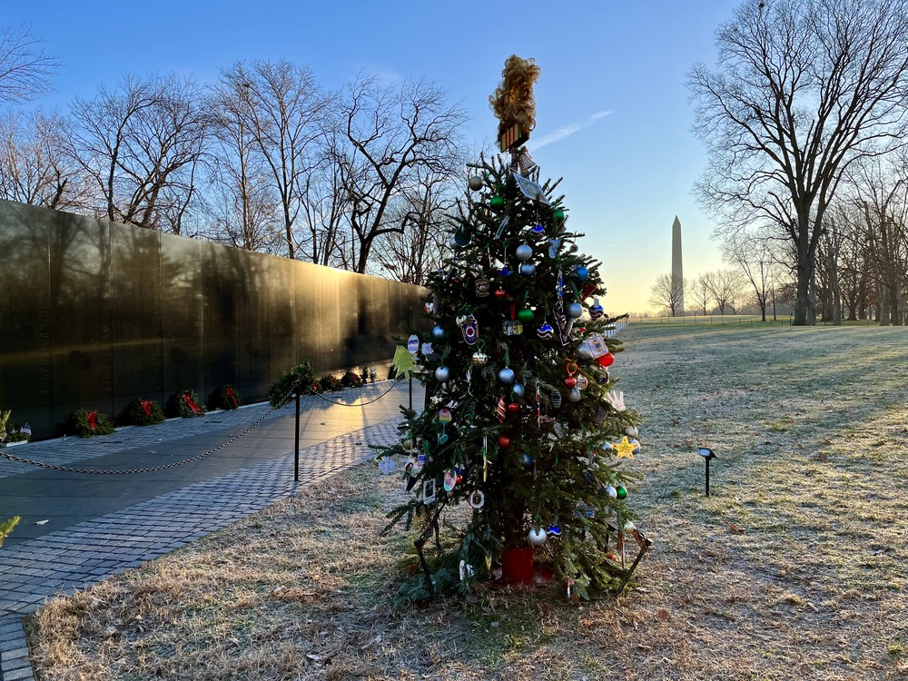 Decorated Christmas tree near the Vietnam Veeran's Memorial wall and walkway, which is lined with wreaths